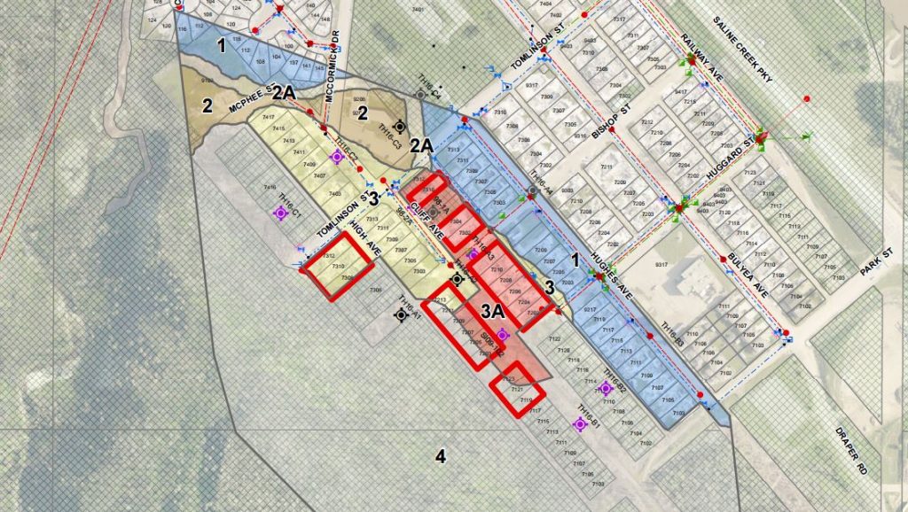 Properties outlined in darker red will be bought by the RMWB. 